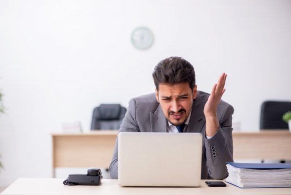 Person frustrated at their pc